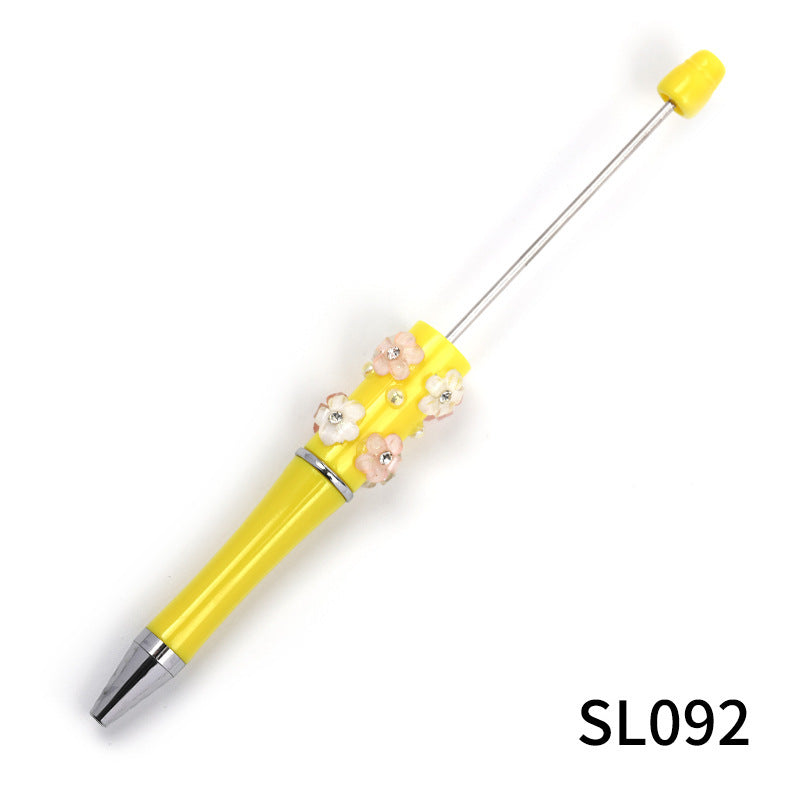 Heavy Industry DIY diamond-encrusted five-petaled flower bead pen multi-color rotating ballpoint pen spot wholesale support mixed batch