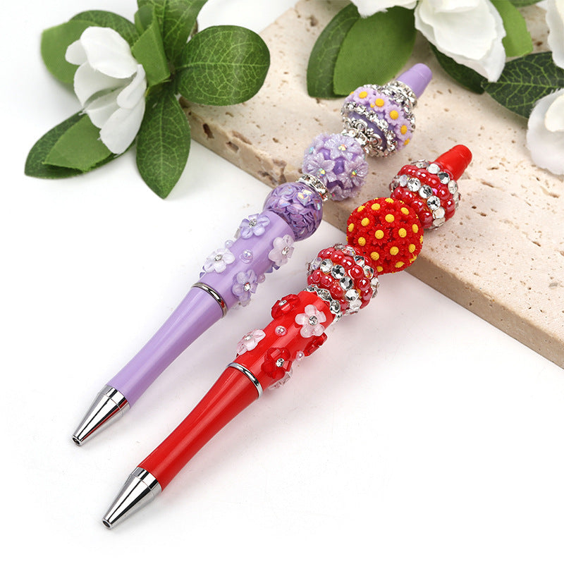 Heavy Industry DIY diamond-encrusted five-petaled flower bead pen multi-color rotating ballpoint pen spot wholesale support mixed batch