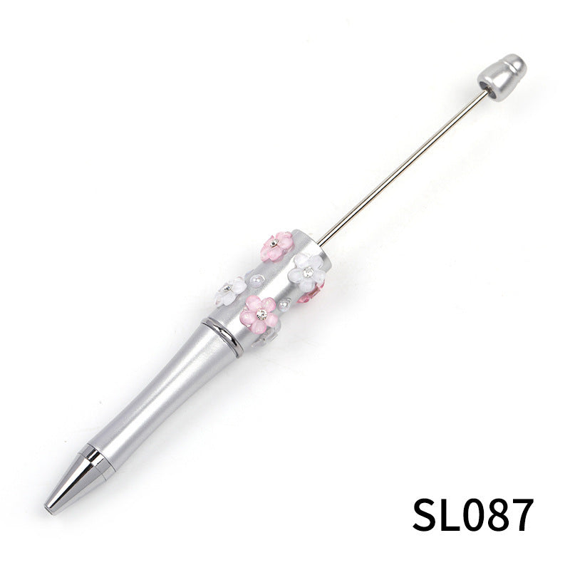 Heavy Industry DIY diamond-encrusted five-petaled flower bead pen multi-color rotating ballpoint pen spot wholesale support mixed batch