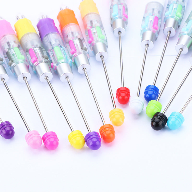 Creative four-color bead pen, multi-color refill, key mark plastic, ballpoint pen, four-color DIY push gift
