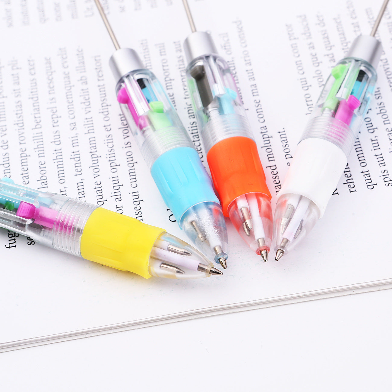 Four-color beaded strokes key marks plastic ballpoint pen DIY multi-color press-action promotional gift pen spot wholesale