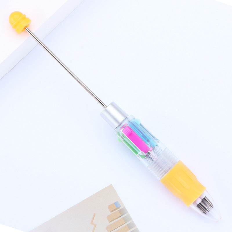 Four-color beaded strokes key marks plastic ballpoint pen DIY multi-color press-action promotional gift pen spot wholesale