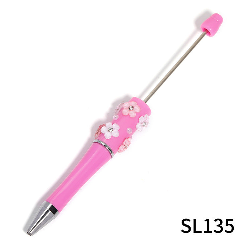 Heavy Industry DIY diamond-encrusted five-petaled flower bead pen multi-color rotating ballpoint pen spot wholesale support mixed batch