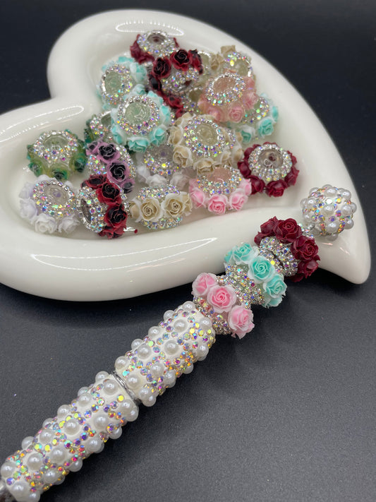 Sparkling beads with a circle of flowers, random mix of colors