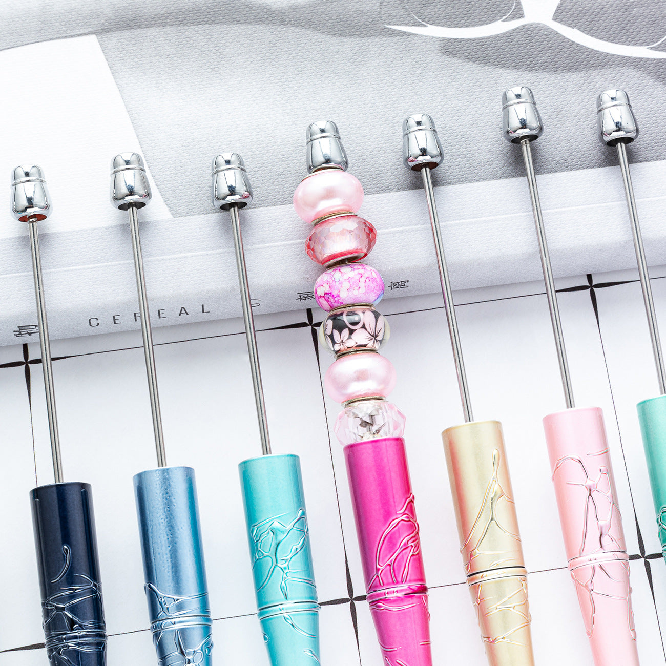 Bead pen, spot wholesale DIY creative relief UV beaded ballpoint pen gilt spot swirling plastic ballpoint pen