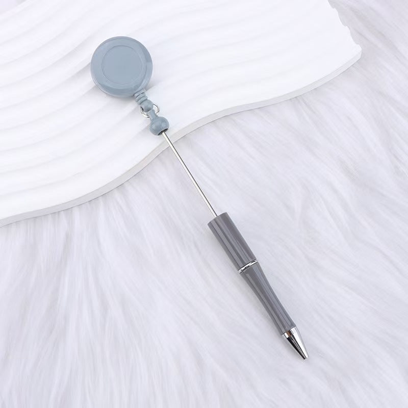 New easy-to-pull buckle beaded ballpoint pen, retractable plastic easy-to-pull retractable buckle, creative bead pen pull wire buckle