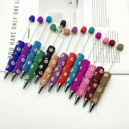 The new daisy full diamond bead pen, purely handmade DIY creative full diamond pen, daisy shape business gift pen is in stock.