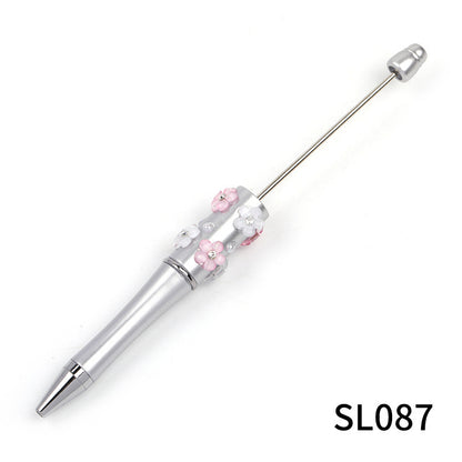 Heavy Industry DIY diamond-encrusted five-petaled flower bead pen multi-color rotating ballpoint pen spot wholesale support mixed batch