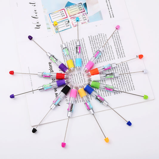 Four-color beaded strokes key marks plastic ballpoint pen DIY multi-color press-action promotional gift pen spot wholesale