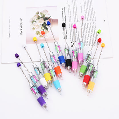 Four-color beaded strokes key marks plastic ballpoint pen DIY multi-color press-action promotional gift pen spot wholesale