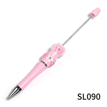 Heavy Industry DIY diamond-encrusted five-petaled flower bead pen multi-color rotating ballpoint pen spot wholesale support mixed batch