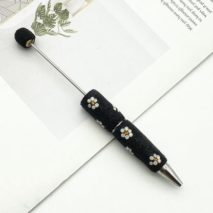 The new daisy full diamond bead pen, purely handmade DIY creative full diamond pen, daisy shape business gift pen is in stock.