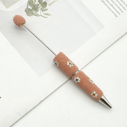 The new daisy full diamond bead pen, purely handmade DIY creative full diamond pen, daisy shape business gift pen is in stock.